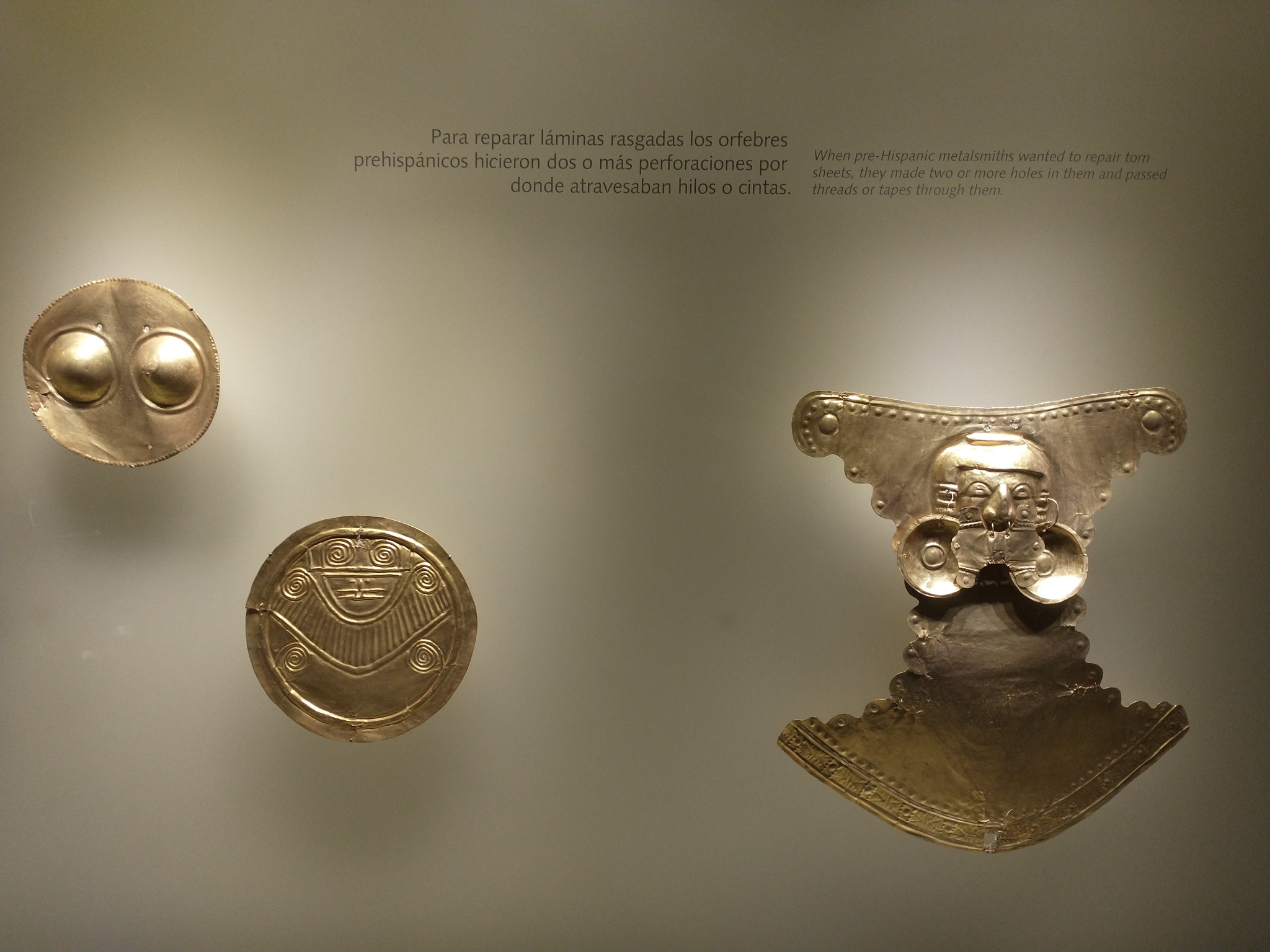 Bandeja paisa lunch plate with chicharrones, ground beef, avocado, plantains, potato, pinto beans, arepa, and white rice. 